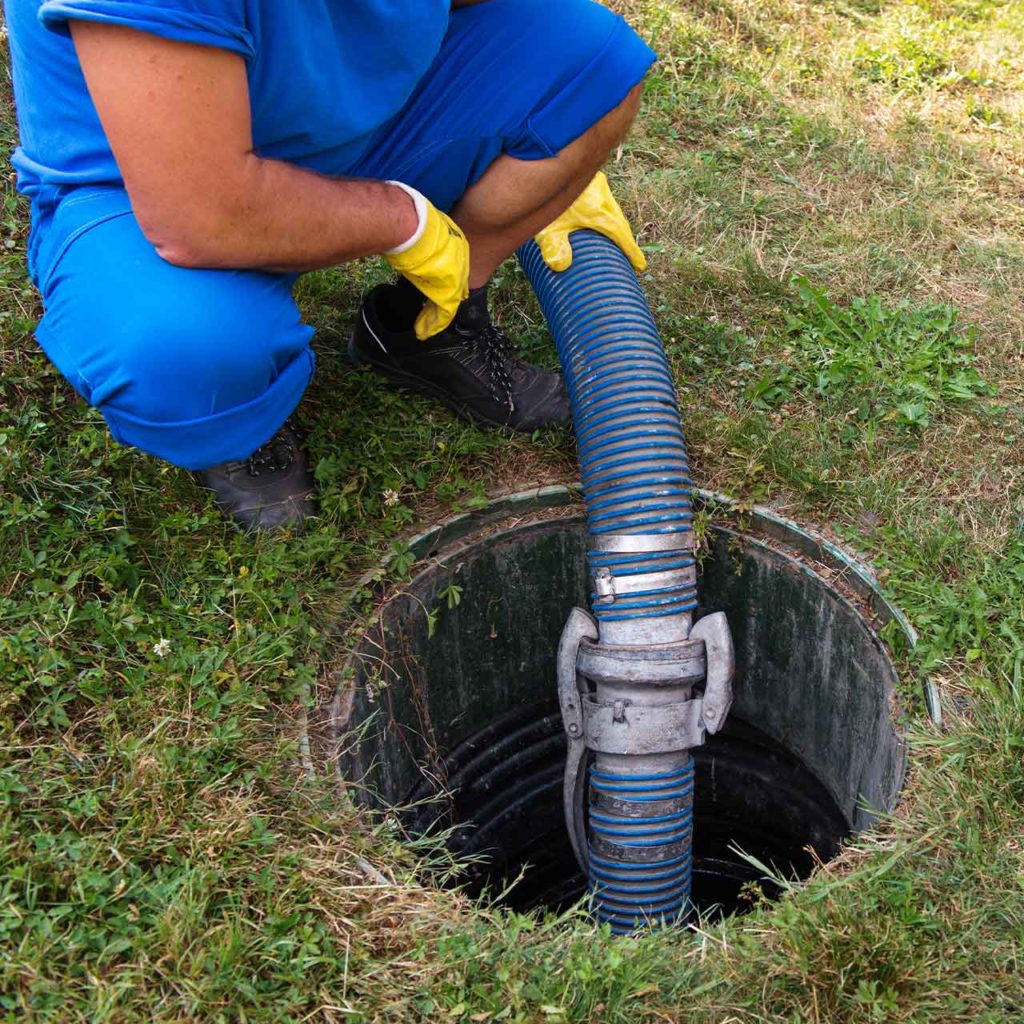 man with a drain cleaning pipe mahwah nj