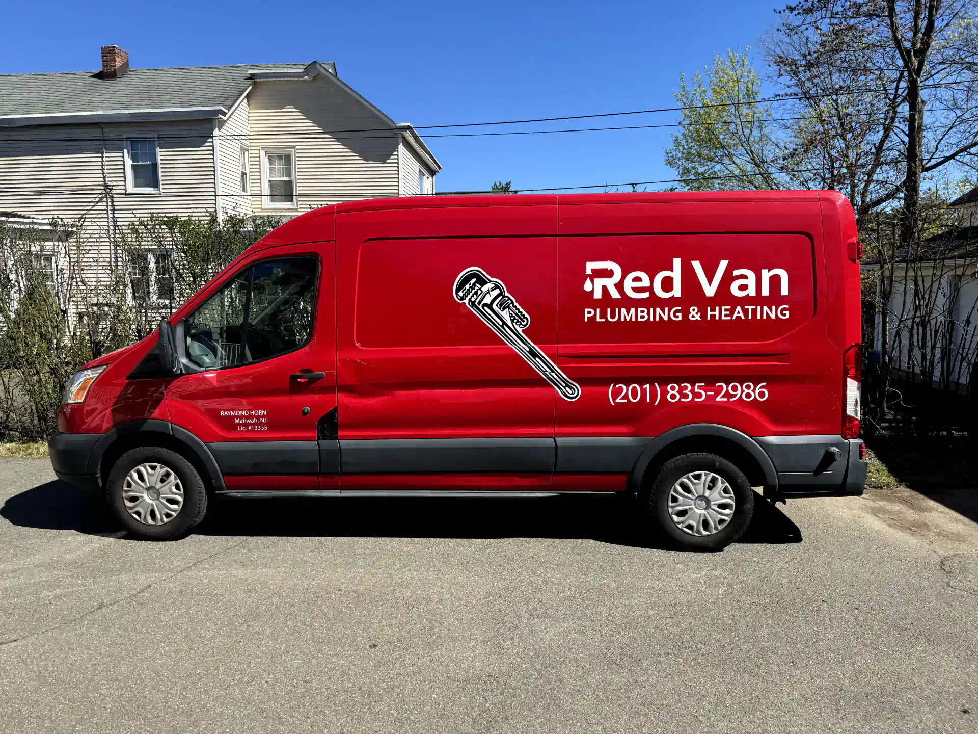 red van with the logo on a side